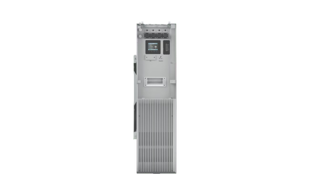 A tall, narrow industrial electronic control unit or server chassis shown upright on a plain white background. The unit is primarily light gray/silver with a small dark display screen near the top and a ribbed front grille section near the bottom.