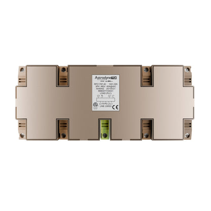 An Astrodyn 4000 industrial electronic module, model DRS-1750-4000, shown from a top-down view on a solid white background. The module features a metallic gold chassis with a central white label containing technical specifications and a small green indicator window.