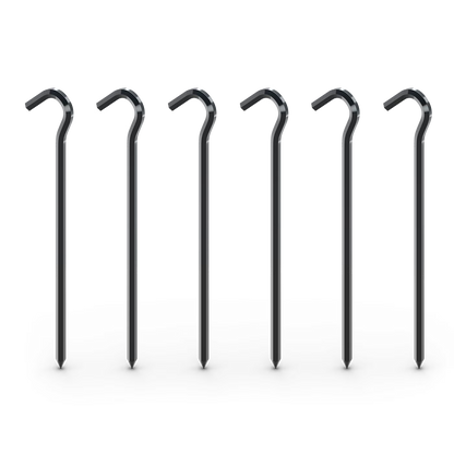 Set of six metal stakes on a white background