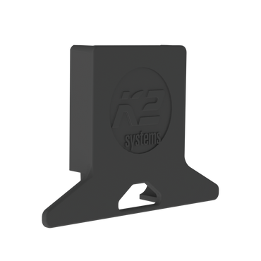 K2 Systems 4000250 MiniRail Polyamide Rail End Cap a matte black plastic or rubber mounting bracket with a circular embossed logo reading 'K2 systems' on the front face, shown on a plain white background.