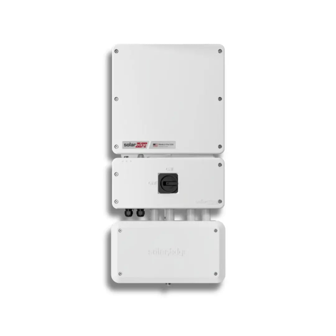 Three white SolarEdge inverters stacked vertically against a plain white background, showing both front and back panels.
