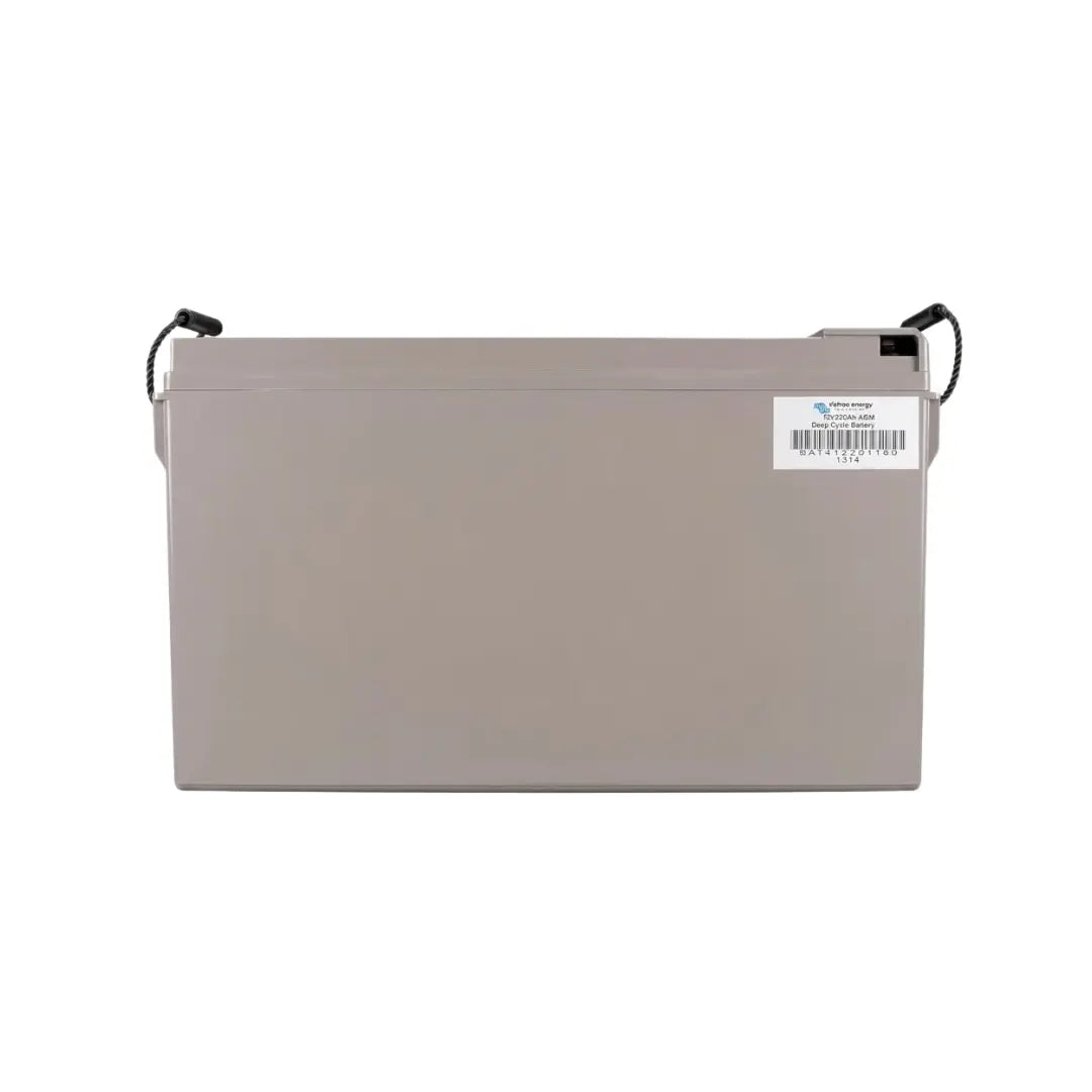 A rectangular gray industrial battery with black terminal straps on the sides and a white barcode label on the top right, shown against a plain white background.